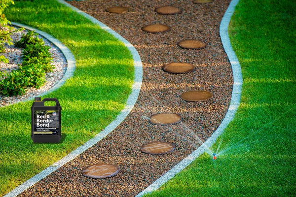 Homeowner relaxing in a tidy mulched yard after applying Bed & Border Bond